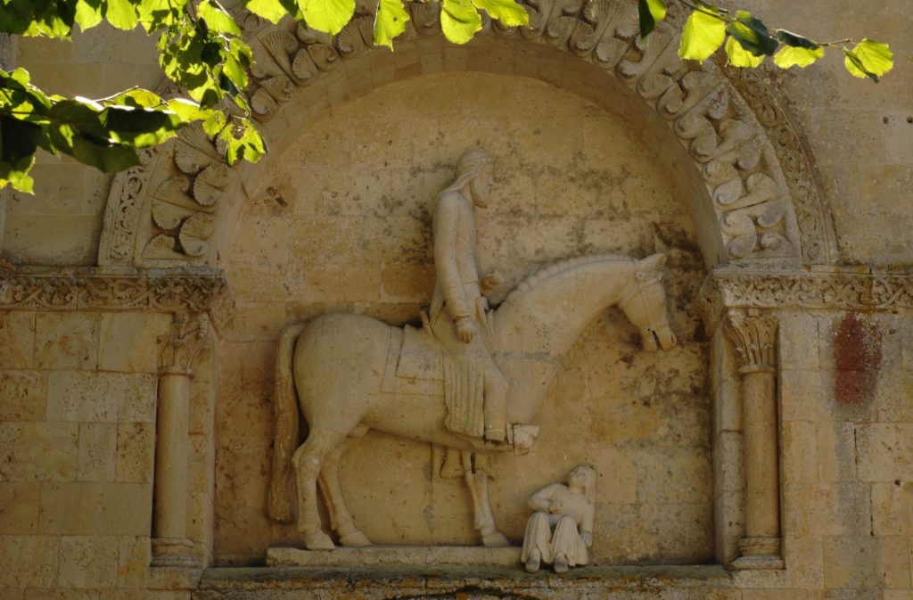 Church of Saint Hilaire Cavalier north portal _ Melle